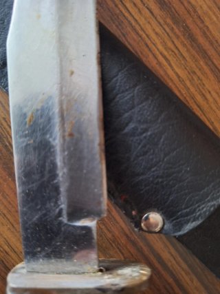 Navaja de bolsillo con funda de cuero