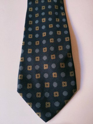 Corbata azul y dorada con estampado