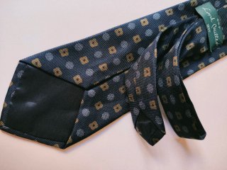 Corbata azul y dorada con estampado