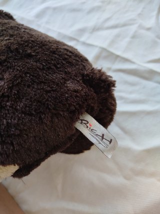 Peluche de mono marrón
