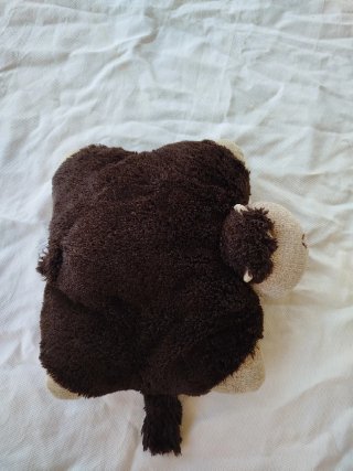 Peluche de mono marrón