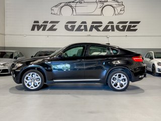 BMW X6 xDrive50i V8 Biturbo 407 CV · Nacional · 120.000 km