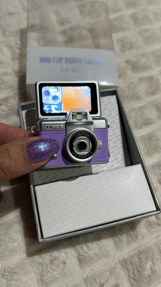 Mini cámara lila 1080p
