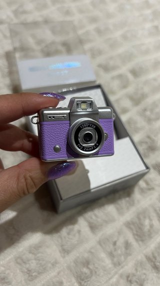 Mini cámara lila 1080p