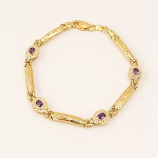 Pulsera Oro 18kl con piedras moradas COR-TRA-2372