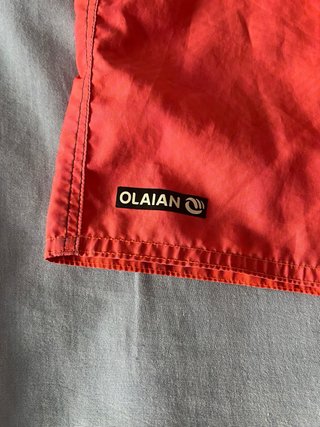 Bañador niño Decathlon negro naranja talla 10aprox