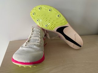 Zapatillas Nike Running Blancas y Fucsia
