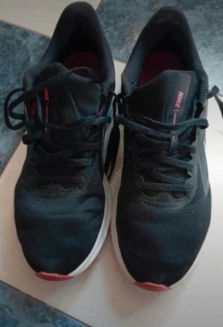 Zapatillas running mujer Nike negras y rosas