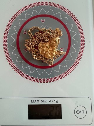 Cadena y Medalla Oro 18k 26gr las dos .