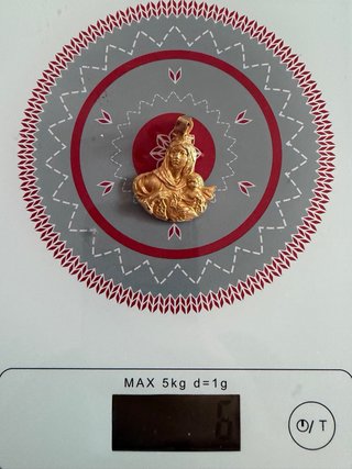 Cadena y Medalla Oro 18k 26gr las dos .