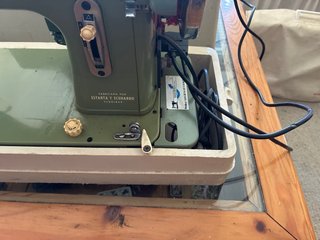 Máquina de coser Sigma verde