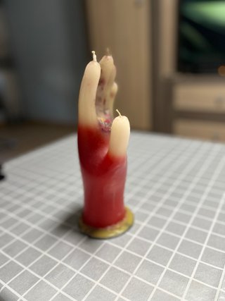 Vela mano roja y beige