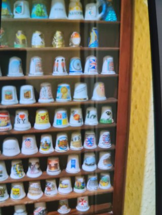 Collezione di ditali decorativi