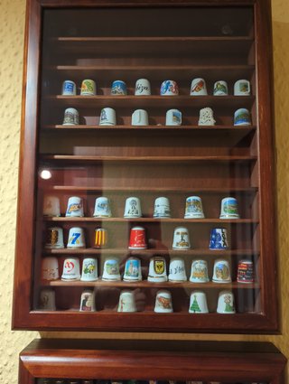 Collezione di ditali decorativi