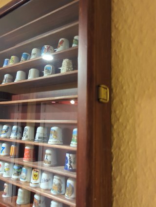 Collezione di ditali decorativi