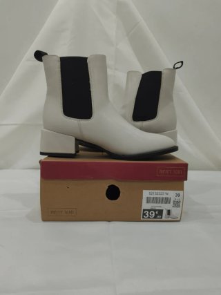 Botines blancos roto Merry Scott