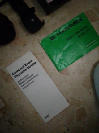 Cámara Hanimex con accesorios