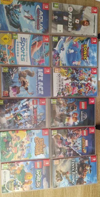 Nintendo Switch + Complementos + Pack 13 juegos