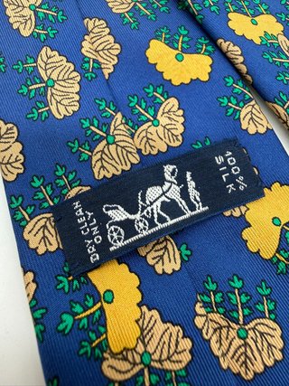 Corbata Hermès azul y amarilla