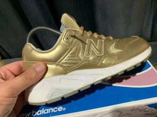 Zapatillas New Balance 37 doradas