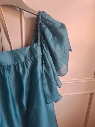 Blusa azul turquesa manga corta