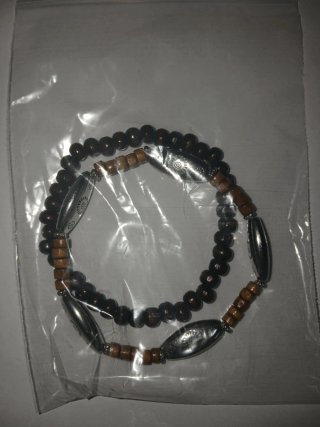 Braccialetti uomo legno e argento