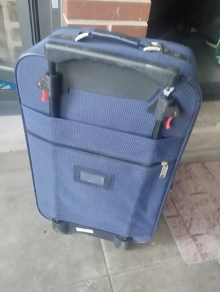 Maleta de viaje azul marca BAGSLITE