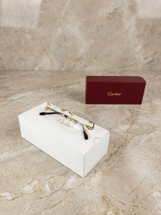 Gafas Cartier Rimless Oro – Elegancia y Lujo