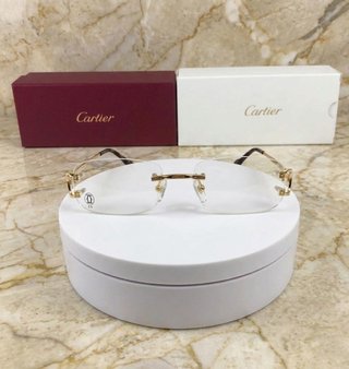 Gafas Cartier Rimless Oro – Elegancia y Lujo