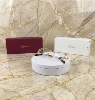 Gafas Cartier Rimless Oro – Elegancia y Lujo