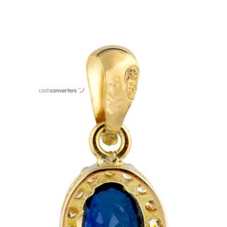 colgante oro 18k con piedra con zafiro