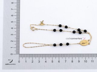 manita oro 18k con piedra con onix
