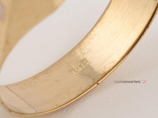 sello oro 18k con piedra con circonita