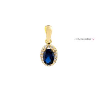 colgante oro 18k con piedra con zafiro