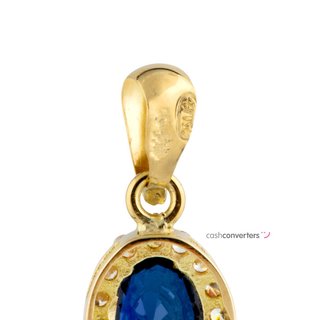 colgante oro 18k con piedra con zafiro