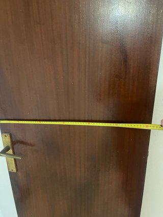 Puerta de madera con cristal