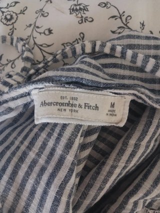 Camiseta a rayas con encaje talla M