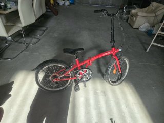 Bicicleta plegable roja B'TWIN