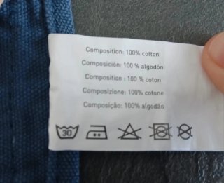Grembiule da cucina blu con dettagli in pell