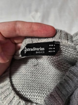 Jersey de punto gris trenzado