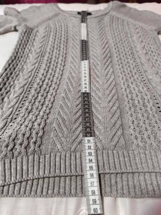Jersey de punto gris trenzado