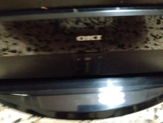 Televisor OKI Plano Negro con mando a distancia