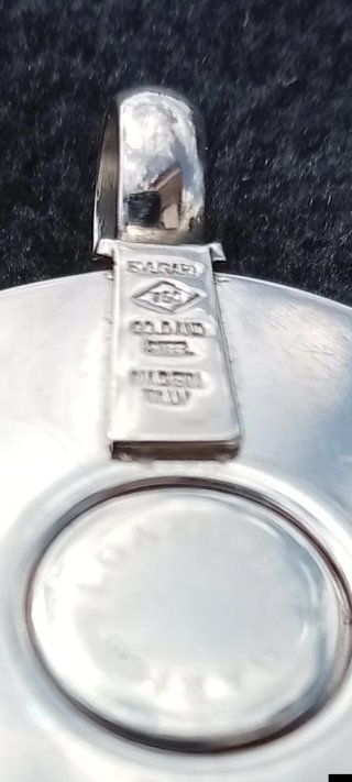 Colgante Bvlgari oro blanco 18 kilates y Nácar