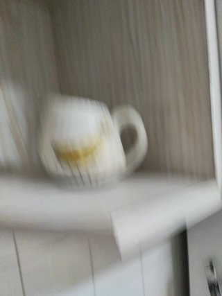 Juego de jarras y tazas de cerámica