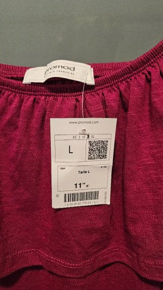 Camiseta rosa sin mangas con volantes