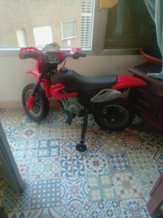 Moto eléctrica infantil roja