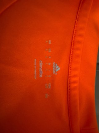 Camiseta deportiva Adidas naranja