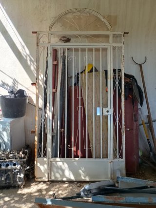 Puerta de cancela de hierro forjado