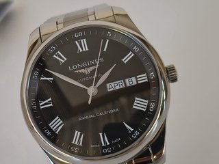 Reloj Longines Esfera Negra y Correa Plateada