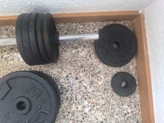 Barra y discos musculación